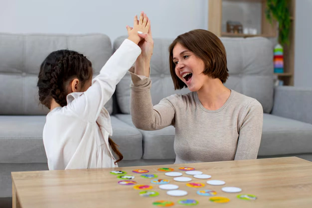 front-view-mother-girl-playing-game_23-2150062592